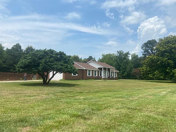View from the driveway of this beautiful country home.