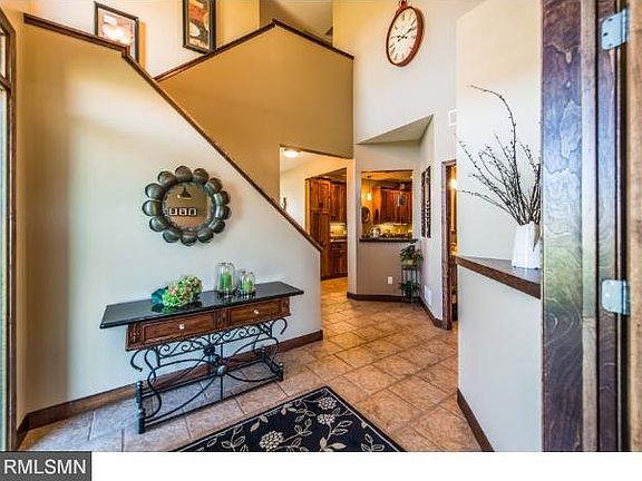 Open foyer with tiles floors