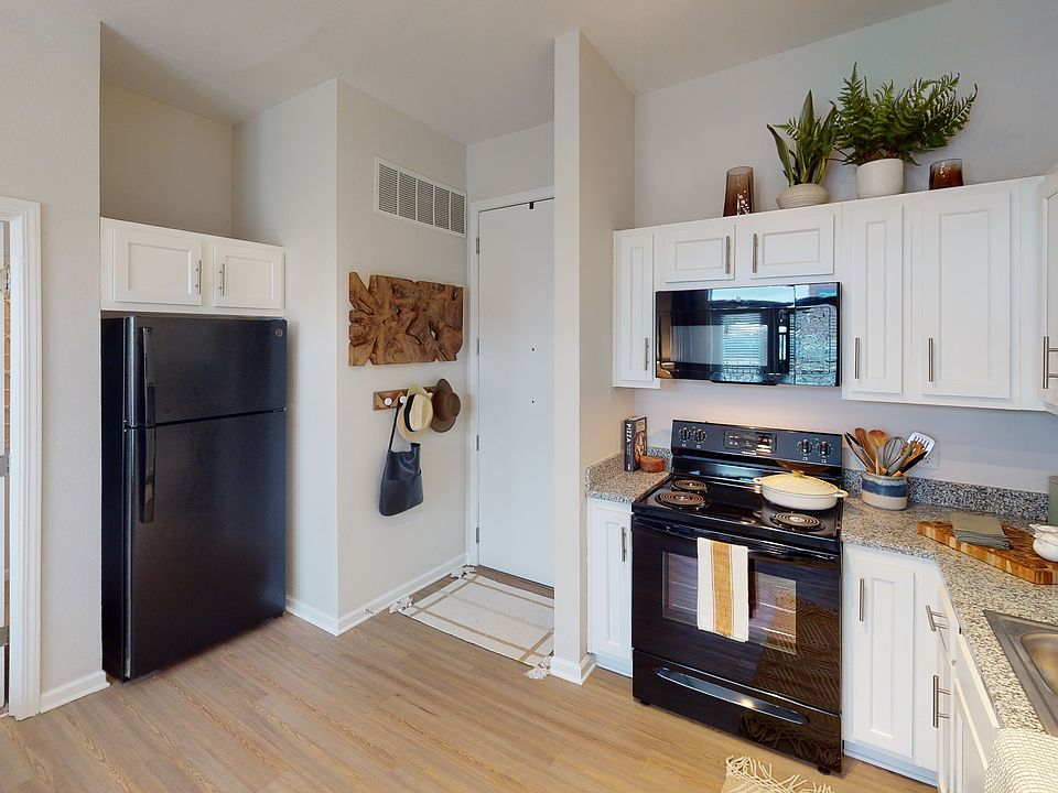 Cook and Entertain in a Modern Kitchen with Granite Countertops at Ralston Apartments
