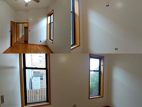 First bedroom with two windows, closet and ceiling fan.