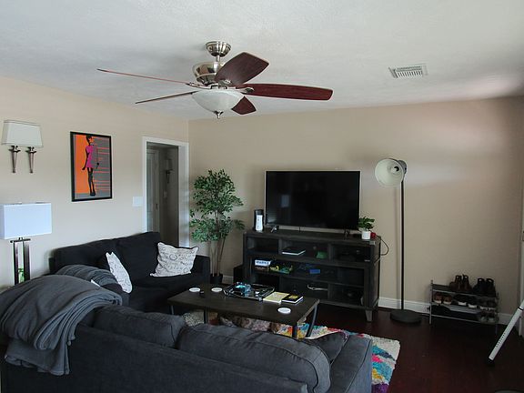 Living room. Plenty of light thru insulated windows. All windows have 2" mini-blinds.