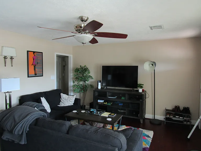 Living room. Plenty of light thru insulated windows. All windows have 2" mini-blinds.