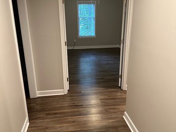 Entry way looking into first bedroom/office.
