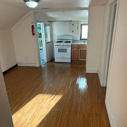 Dining Room and Kitchen and Door to Deck.
