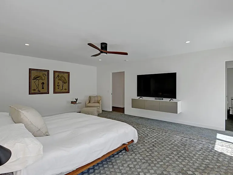 King bed , 70" screen in primary bedroom