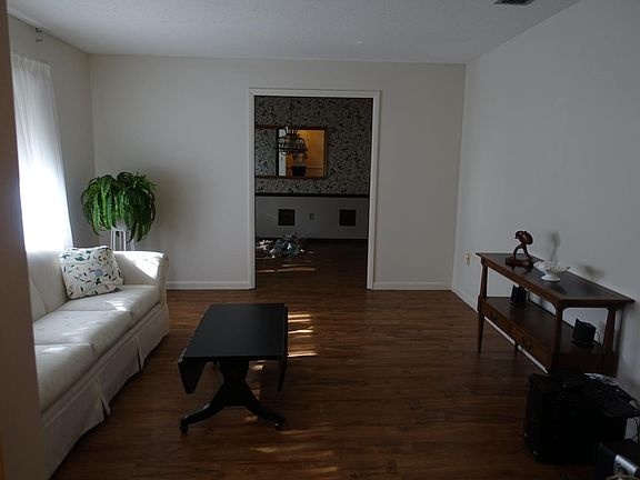 Living room looking into formal dining room