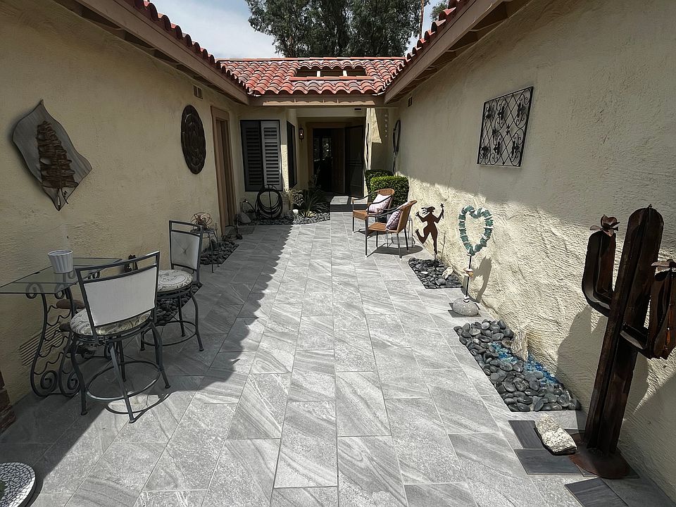 Walking through the front gate into the front patio