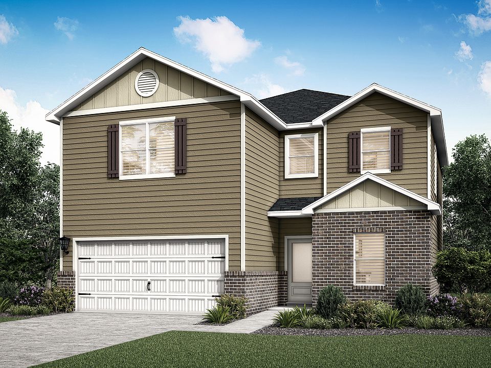 The Driftwood is a beautiful two-story home with siding and brick and front yard landscaping
