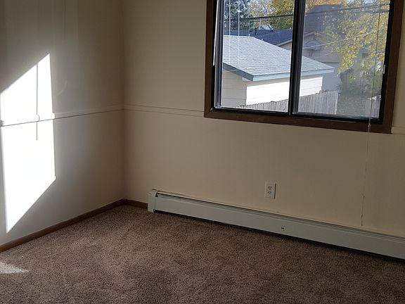 Corner bedroom 1 with 2 windows & full size closet. Room is