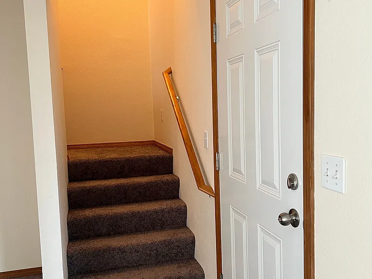 Staircase leading to upstairs.