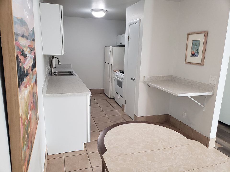 Kitchen. Ceramic flooring. New cabinets, New dishwasher. Fresh paint.