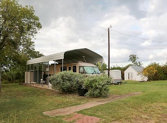 RV Cover and set up, does not include RV