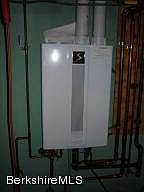 High efficiency wall mounted gas furnace