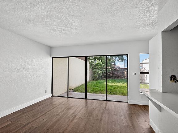 Dining room and glass sliding doors to backyard