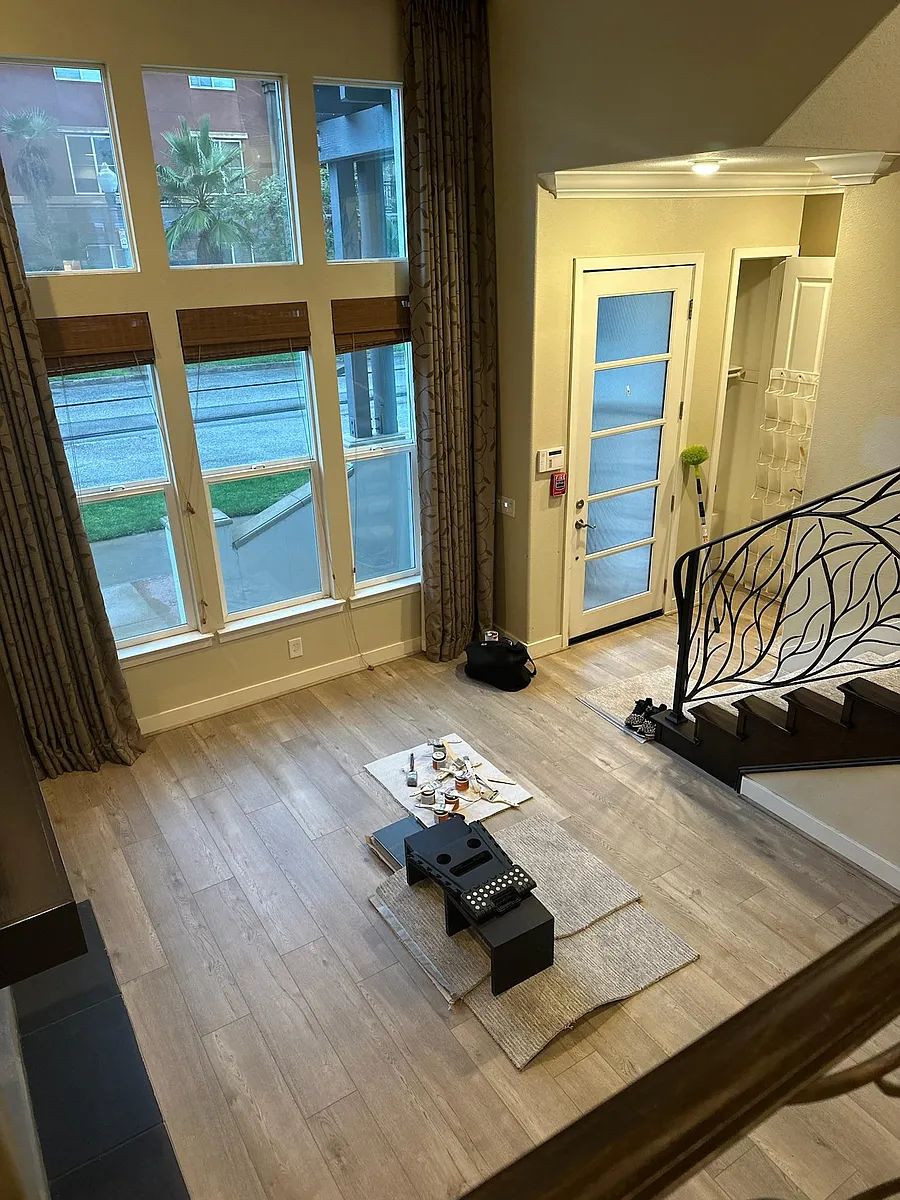 View of living room from dining area. Lots of windows and great light - Celedon Crk