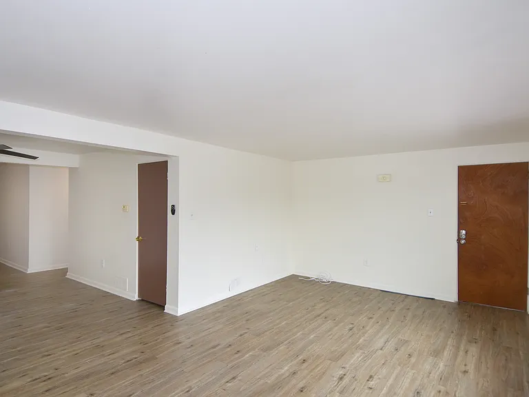 Separate spacious & freshly painted living and dining rooms with luxury vinyl plank flooring throughout.