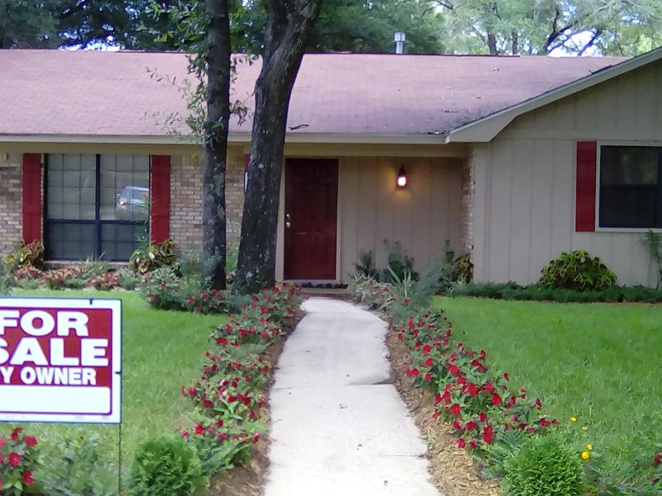 Full front yard totally landscaped