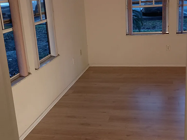 Left side of bedroom looking from bathroom door.