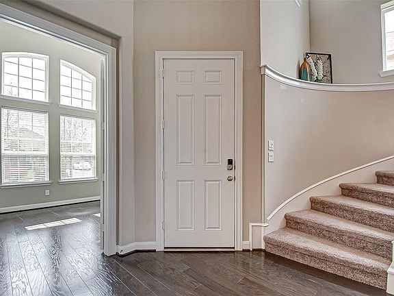 Beautiful dark floors with a peek at your study!