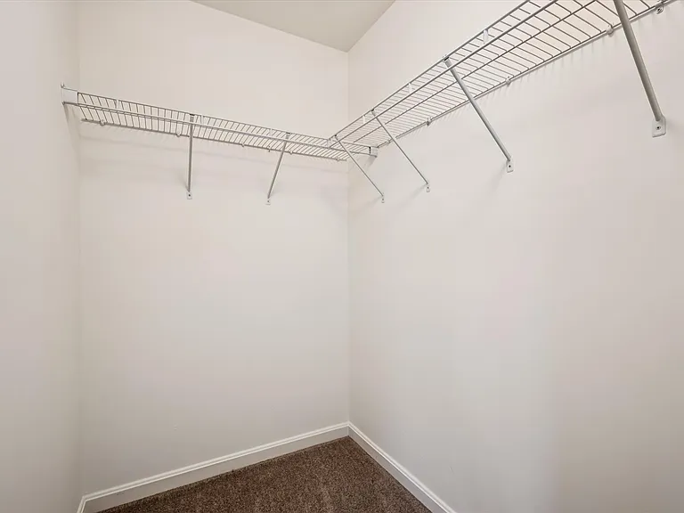 Walk In Closet for Primary Bedroom