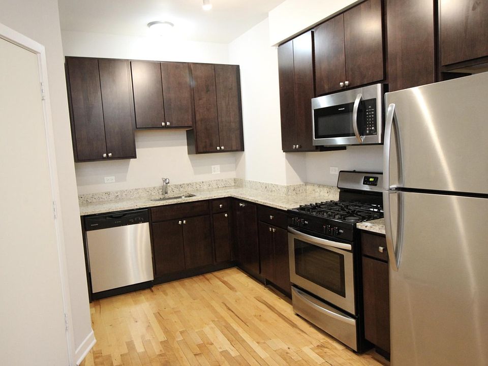 Modern Kitchen with Stainless Steel Appliances including Dishwasher