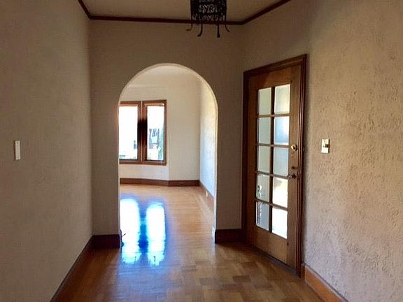 Foyer at entrance leading to living room