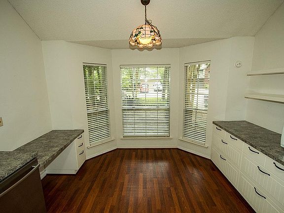 built-in desk, laminate flooring,