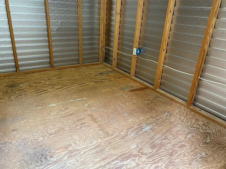 Inside View of Shed with Electric Plug and Lights