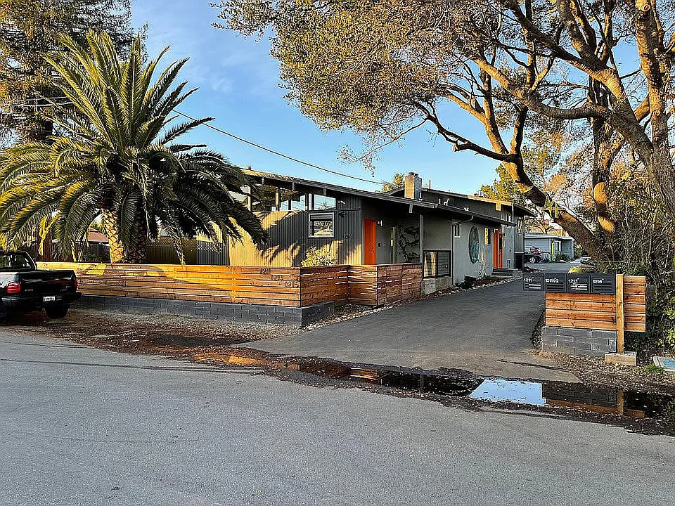 Entry to complex - duplex beyond driveway and parking