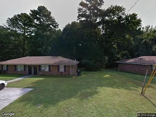 Clean, all brick secure duplex for rent!! Unit on the right side is available for rent Janurary 26, 2024!! It has a private fenced in back yard, stove, refrigerator in the rental!! Apartment also has hardwood floors and a tiled kitchen.