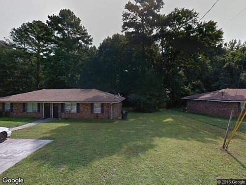 Clean, all brick secure duplex for rent!! Unit on the right side is available for rent Janurary 26, 2024!! It has a private fenced in back yard, stove, refrigerator in the rental!! Apartment also has hardwood floors and a tiled kitchen.