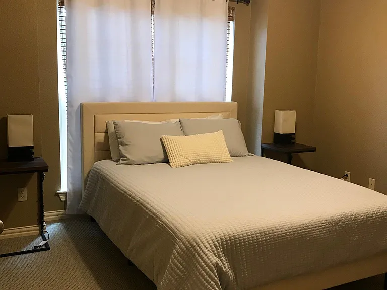 Bedroom #1 w/ walk-in closet. 1 of 2 bedrooms that share a hall bathroom