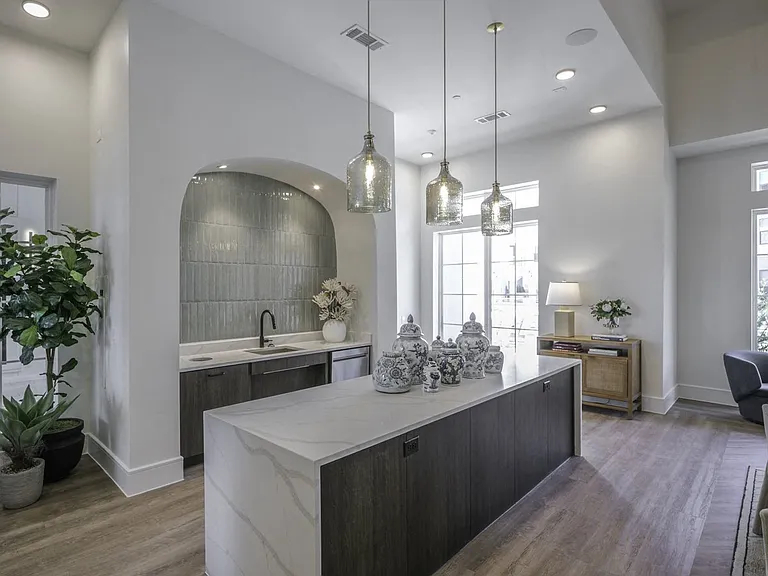 Discover the epitome of elegance at Modera Walsh's expansive clubhouse, featuring refrigeration and a wine fridge for sophisticated entertaining.
