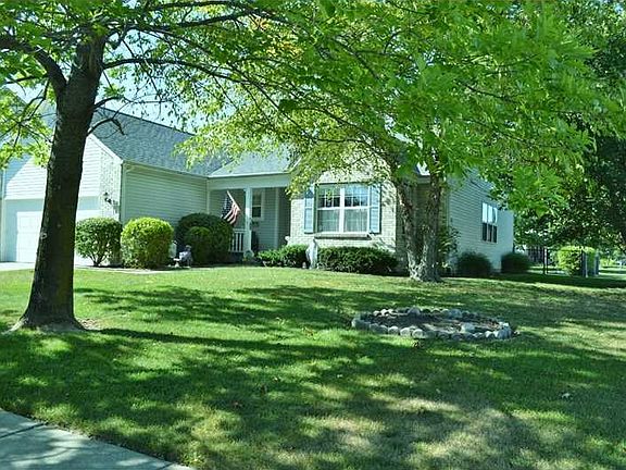 Exterior Front. Sits on a nice corner lot just across road from popular Gazebo area. Nice mature tre