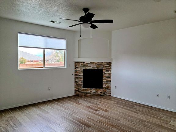 Living room with wood plank tile flooring