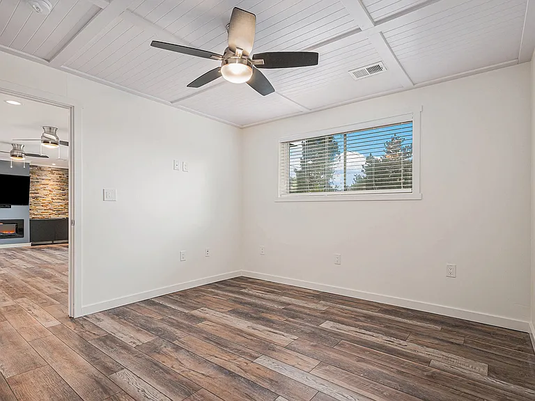 additional angle of 3rd bedroom / office, opening onto 2nd living area / family room