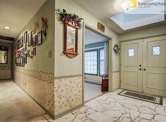 Double door entry with skylight.