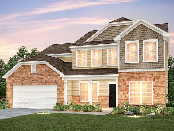 Wingate Exterior 6 features stone, siding, shakes and covered front porch