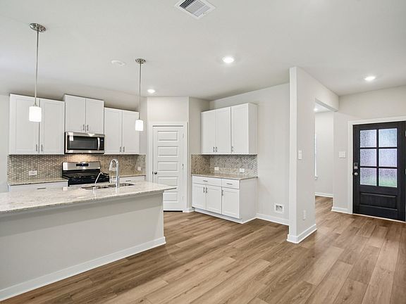 The Oleander floorplan in Kingdom Heights of Rosenberg, TX.