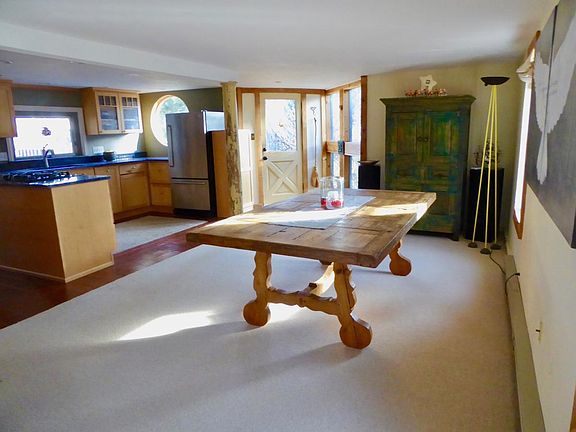 Open floor plan kitchen/ dining