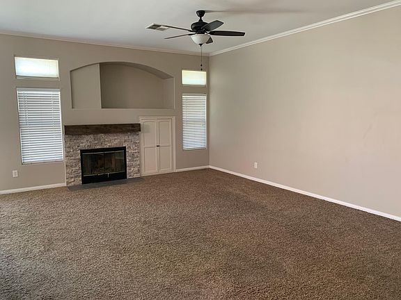 Living room, updated fireplace.