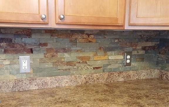 beautiful stone backsplash