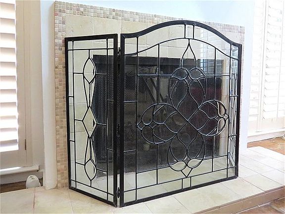 Tile surround fireplace with mosaic edge!