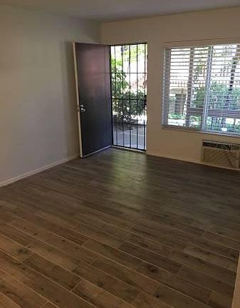 Looking from living room towards front door. Brand new floor