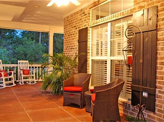 This inviting front porch will beckon you to sit down with a book or enjoy time with family and friends.