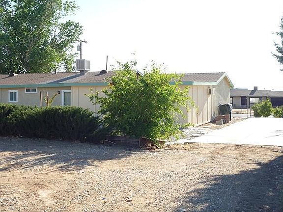 Plenty of room for a pool or RV or toys on this 17,000+ sf Lot.