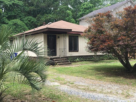 Front and side entrance with off-street parking in driveway