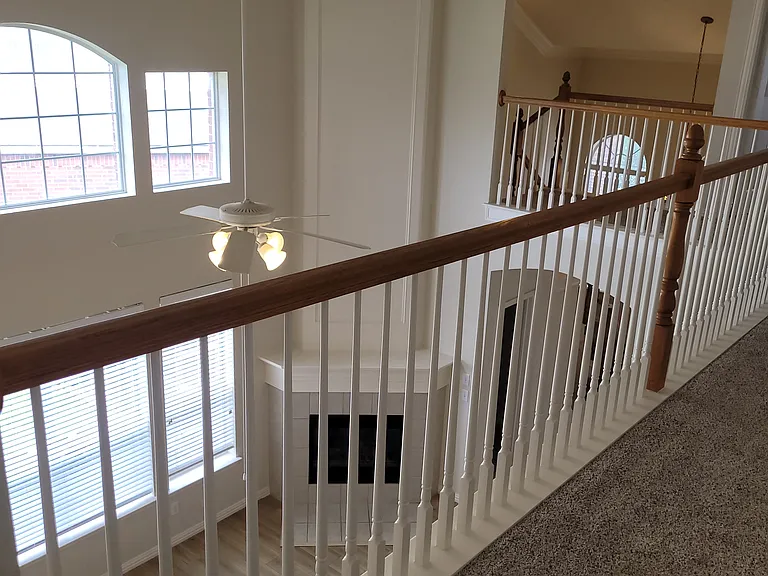 2nd floor hallway with living room view
