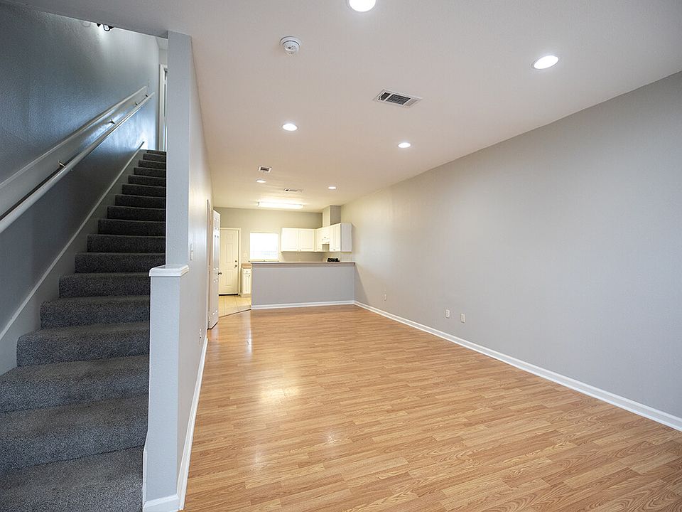 4439-BROWN-STREET-living-kitchen-stairs_01272026