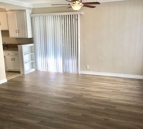 Living Room to Kitchen and Covered Patio